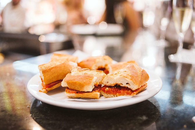 Ultimate Barcelona Food Tour with visit to a Local Market - Torrons i dolços La Campana: turrón with real staying power