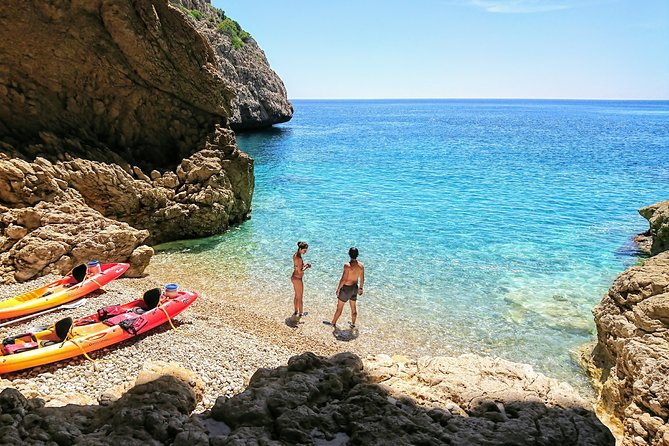 Uncharted Caves & Snorkelling Heaven: Cala Granadella Kayak Tour - Platja Granadella meeting point: parking is the first test