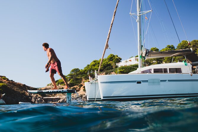 Unforgettable experience in Catamaran Ibiza - LAGOON 400 - Stop 5: Cala d’Hort—sand, turquoise water, and lunch choices