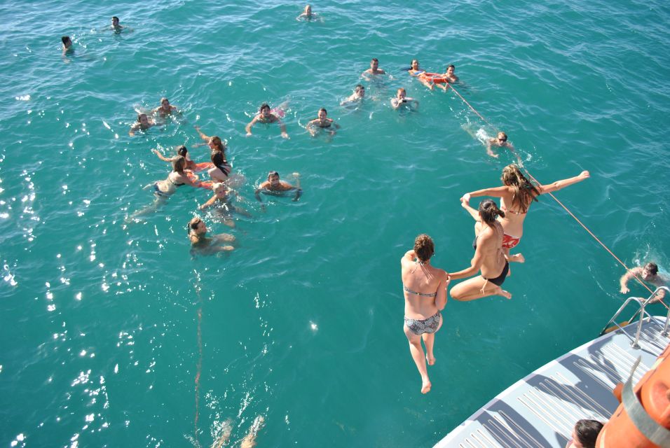 Valencia: Catamaran Cruise, Paella Lunch and Swim Stop - Onboard Lunch: Salad, Chicken Paella, Fruit, and Your Included Drink
