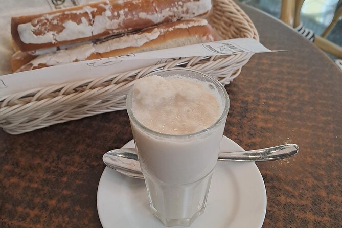 Valencia Food Tour: Tapas, Drinks and Delights with a Local - Start at Plaça del Comte de Bunyol: esgarraet or a sardine pintxo