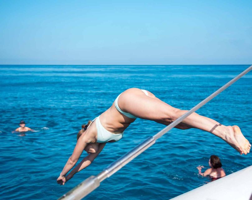 Valencia: Sailing Catamaran Cruise with Valencian Lunch - The swim stop: the highlight, the key rules, and how to maximize your time