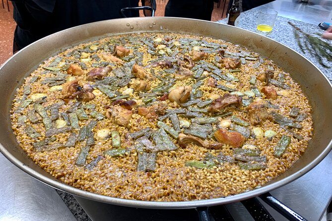 Valencian paella cooking class, tapas and visit to Ruzafa market. - From San Valero to the kitchen: how the pacing works