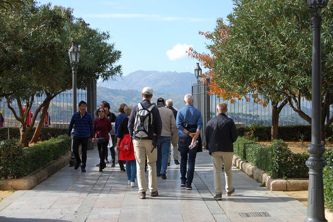 Visit Ronda and Setenil de las Bodegas in one day from Malaga - Timing tips: winter schedules, siesta closures, and rain you can’t argue with