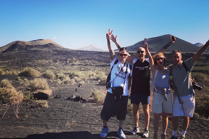 Volcano Trekking Tour (Timanfaya eruptions) - Gear and comfort: provided poles, rain jackets, and the pace that fits most people