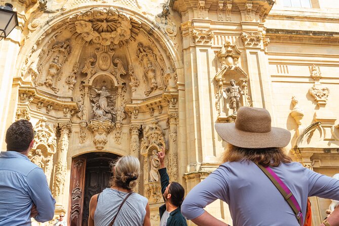 Walking Tour Old town - Ayuntamiento to Konstituzio Plaza: civic power, celebrations, and the old square feeling